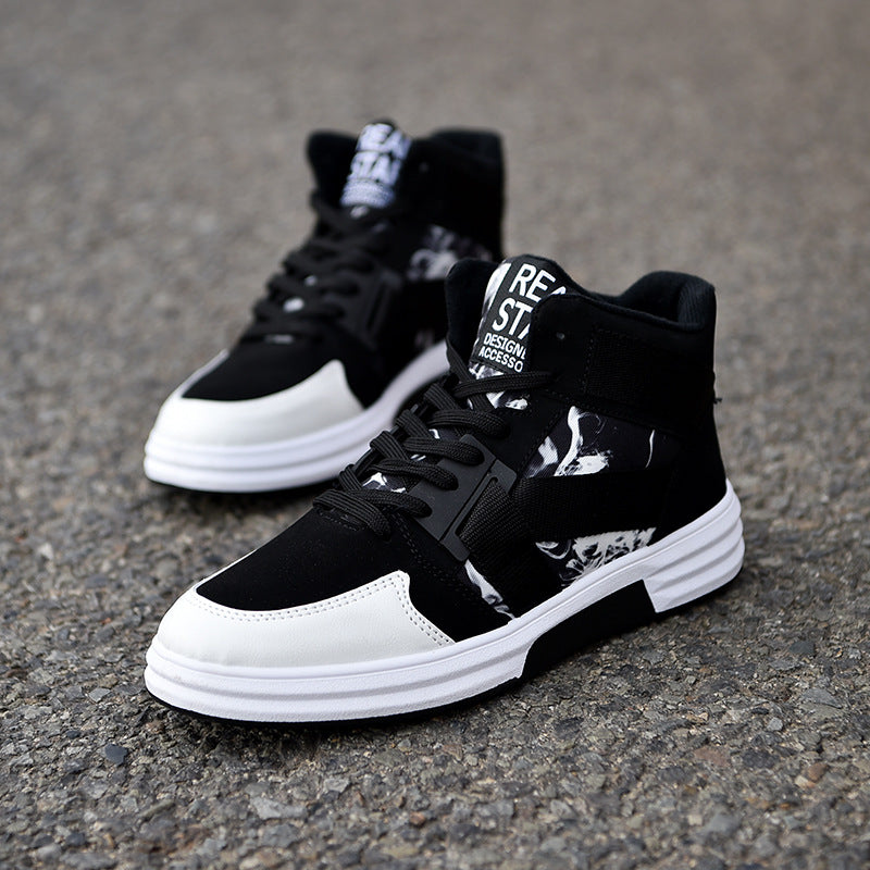 Black and white high-top sneakers with graphic details on asphalt, FashionRay street style shoes