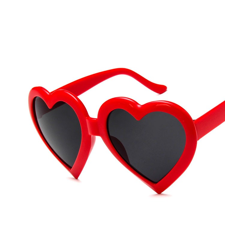 Trendy red heart-shaped sunglasses with black lenses, FashionRay bold style accessory