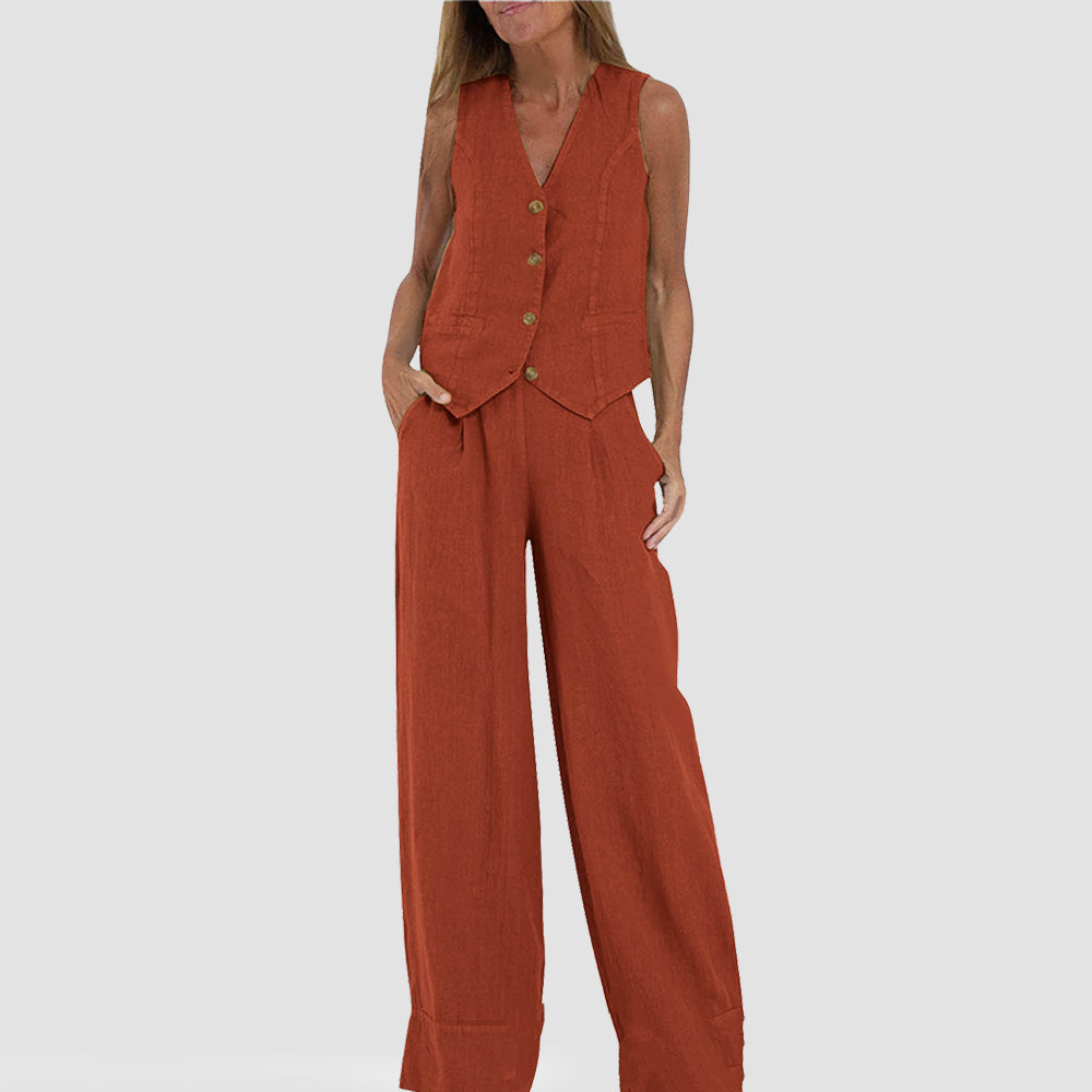 Woman wearing rust orange sleeveless vest and wide-leg pants set, FashionRay style, on white background