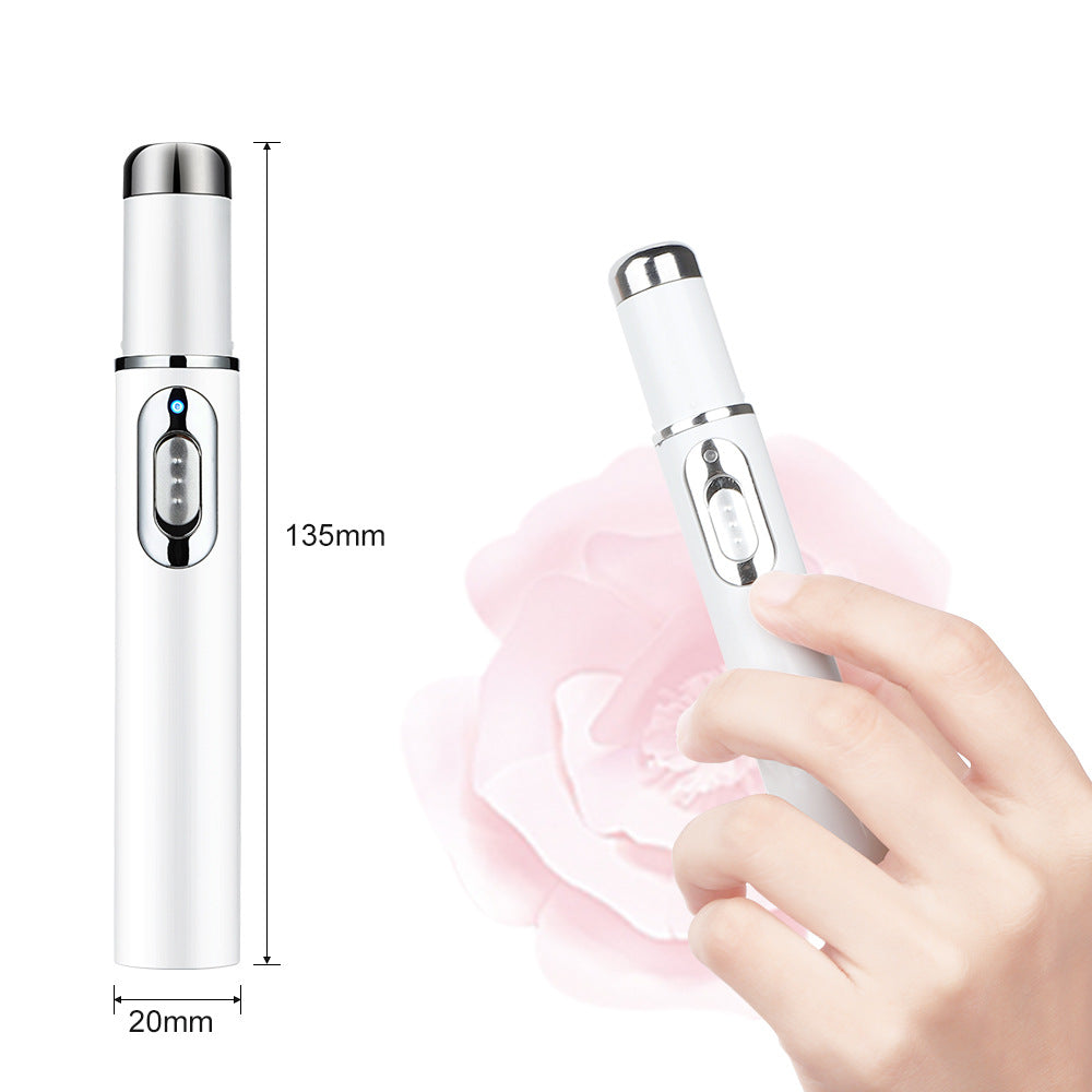 White handheld beauty device with chrome accents, 135mm by 20mm, held by a hand