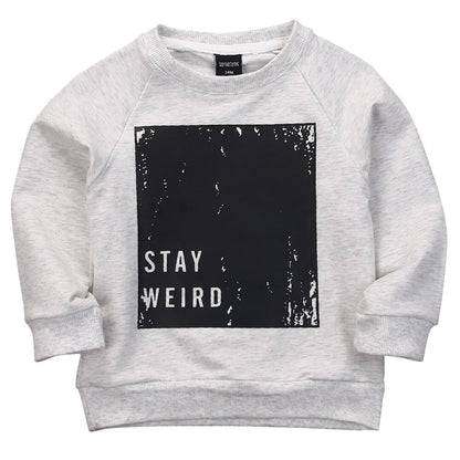 Light gray toddler sweatshirt with black graphic and 'STAY WEIRD' text, FashionRay kids style