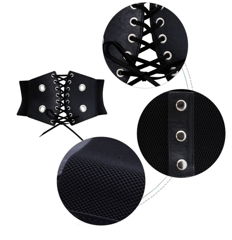Black lace-up wide waist belt with silver eyelet details and close-up texture, FashionRay accessory