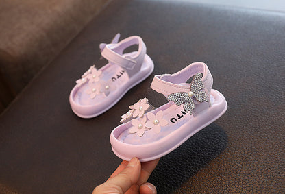 Light purple toddler sandals with flower and butterfly decorations on FashionRay