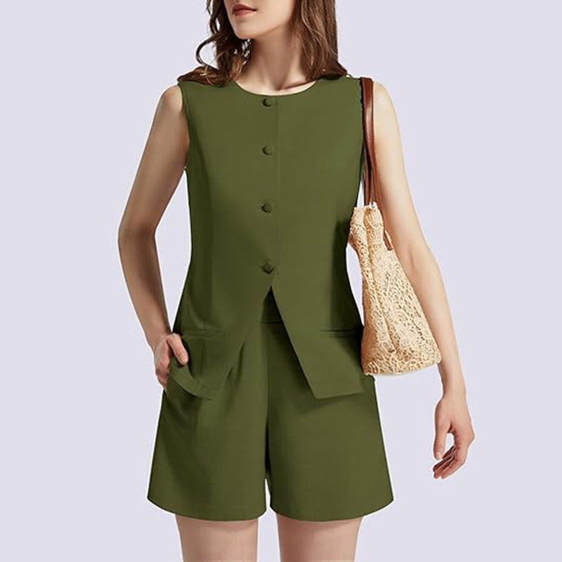 Woman in olive green sleeveless button-up shorts set holding a beige crochet handbag, FashionRay style