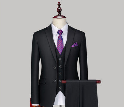 FashionRay black three-piece suit with purple tie and pocket square on mannequin