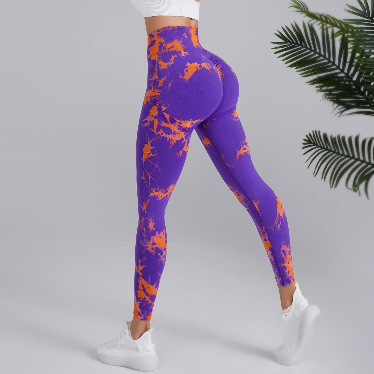 Purple and orange splatter print high-waisted leggings, sporty look, FashionRay style