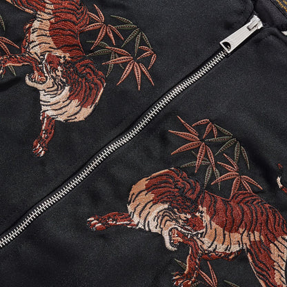 FashionRay black jacket with embroidered tiger and bamboo design, close-up on zipper