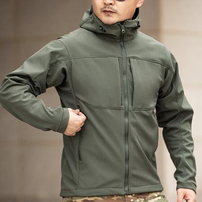 Man in olive green hooded jacket from FashionRay, modern outdoor style, comfort fit
