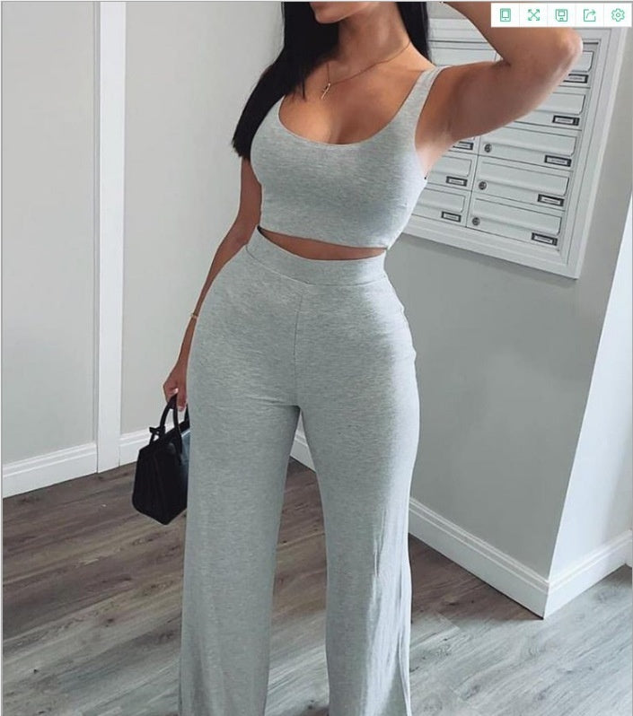 Woman in light gray sleeveless crop top and wide-leg pants, FashionRay trendy lounge set