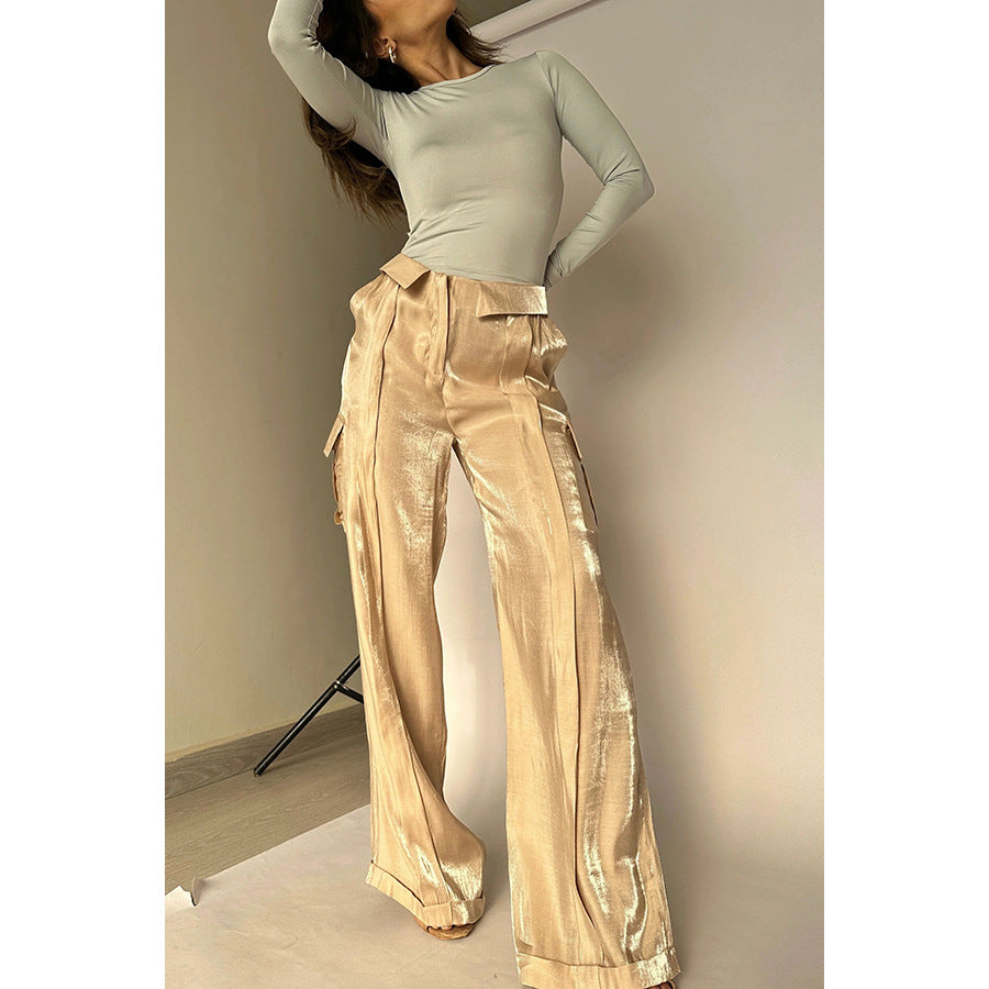 Woman modeling beige satin wide-leg pants and light long-sleeve top from FashionRay