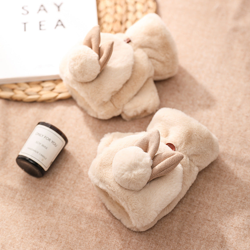 Cozy beige bunny slippers on soft fabric, FashionRay comfort, trendy home accessories