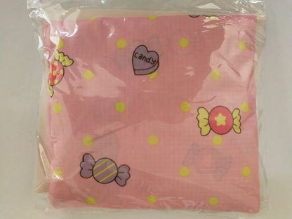 Pink fabric with candy and polka dot print, trendy packaging, FashionRay style