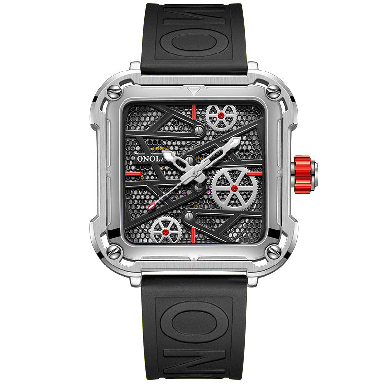 Square black skeleton watch with visible gears, red crown, and bold rubber strap on white background