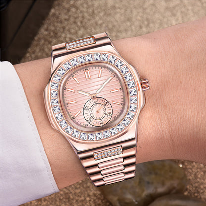 Rose gold luxury wristwatch with crystal bezel on wrist, FashionRay trendy accessory