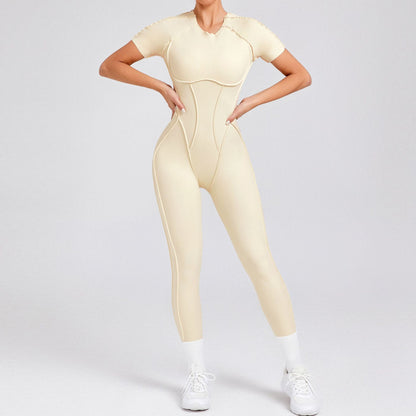 Woman modeling beige seamless jumpsuit with contour stitching from FashionRay, white sneakers