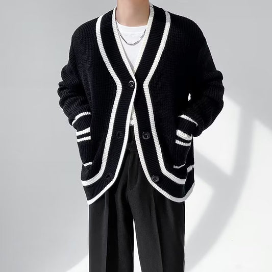 Trendy black cardigan with white trim, relaxed fit, styled for FashionRay modern comfort