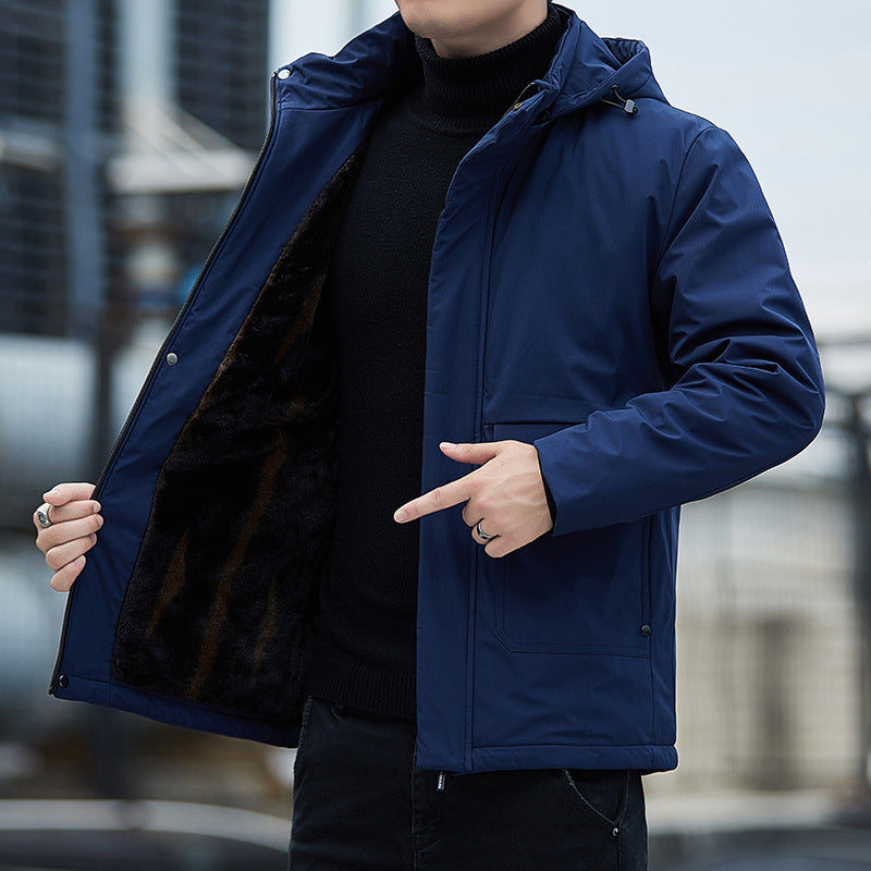 Man wearing blue hooded winter jacket with black fur lining, FashionRay trendy outerwear