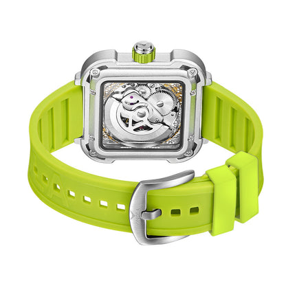 Square mechanical wristwatch with neon green silicone strap, visible gears, modern style