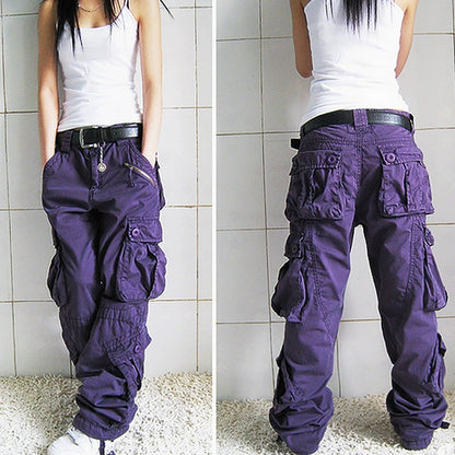 Woman wearing trendy purple cargo pants and white tank top, FashionRay casual style