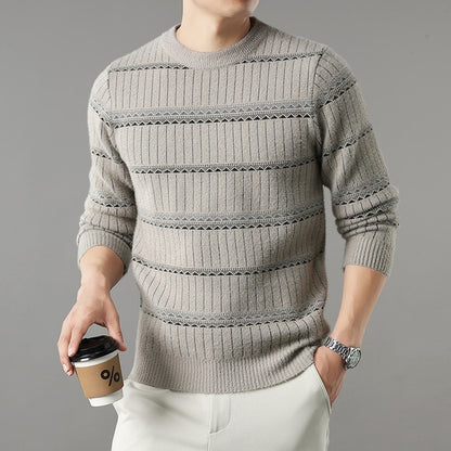 Man in a stylish beige knit sweater with horizontal stripes, holding coffee, FashionRay casual look