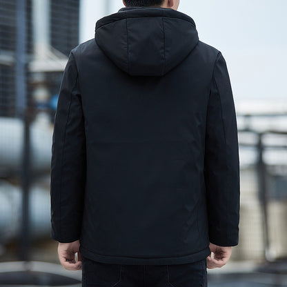 Back view of man wearing black hooded winter jacket from FashionRay outdoors