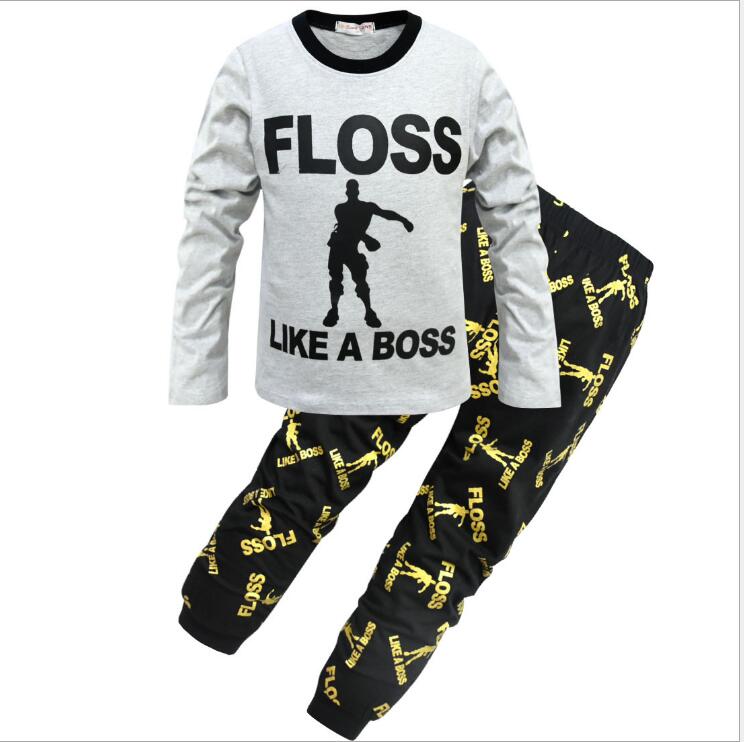 Kids' 'Floss Like a Boss' pajama set with gray top and black printed pants, FashionRay style