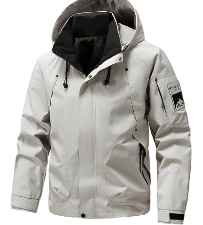 Light gray fashion jacket with hood, black accents, and patch sleeve detail from FashionRay