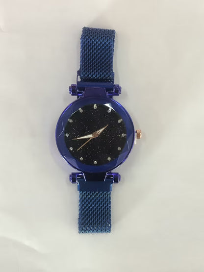 Blue mesh strap watch with black starry dial on white background, FashionRay style accessory