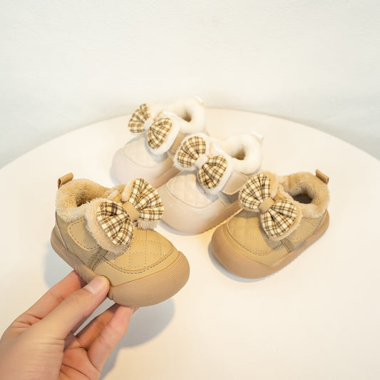 FashionRay cozy toddler shoes in beige and cream with plaid bows, displayed on a white table