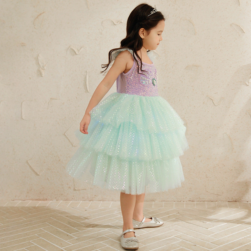 Young girl in a sparkly pastel layered dress and tiara, FashionRay kids fashion