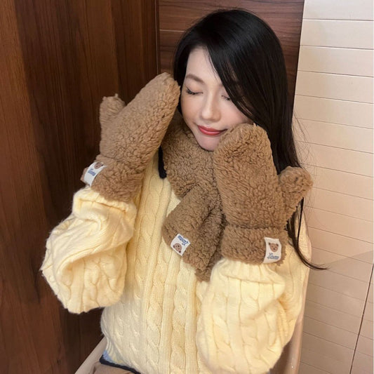 Woman wearing cozy brown teddy mittens and scarf with a yellow knit sweater, FashionRay style