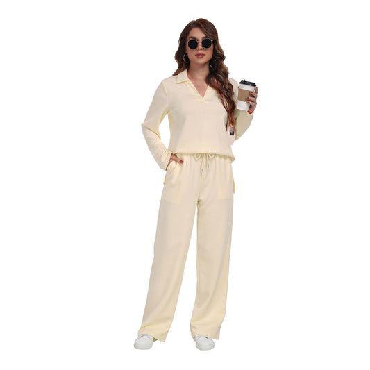Woman in cream lounge set with drawstring pants, sunglasses, and coffee, FashionRay style