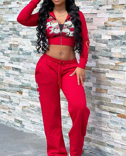 Woman in red graphic crop hoodie and matching sweatpants, casual fashion set, FashionRay