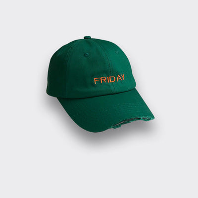 Green baseball cap with orange 'FRIDAY' embroidery and frayed brim on white background