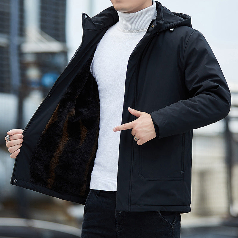 Man wearing black hooded winter jacket with fur lining, white turtleneck, FashionRay style