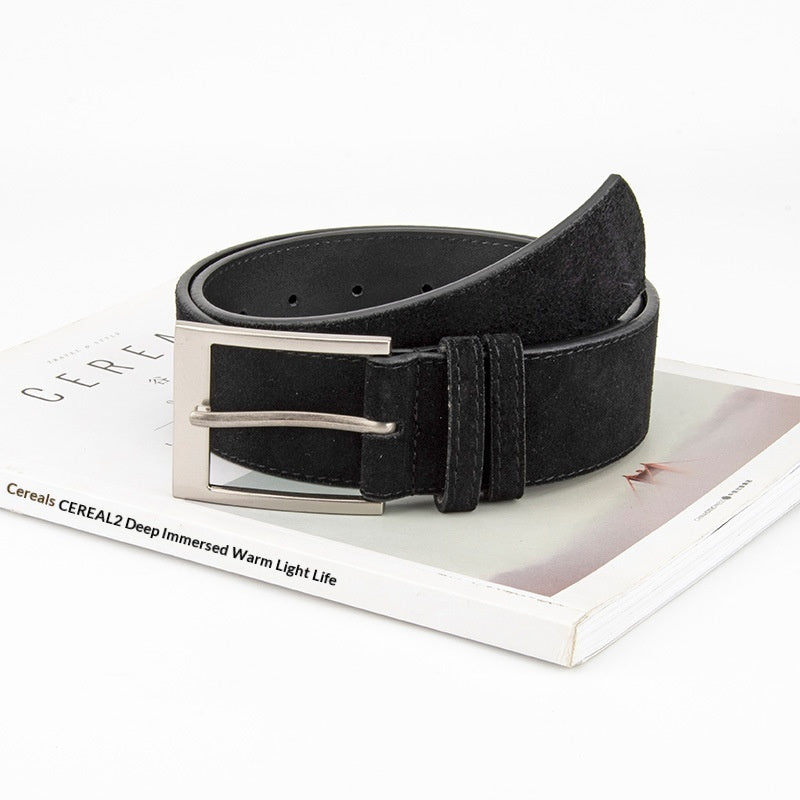 FashionRay black suede belt with silver buckle, displayed on a magazine for stylish men