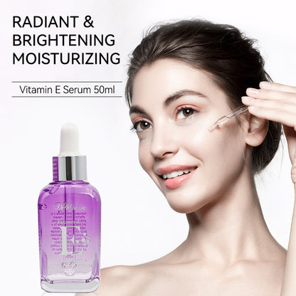 Woman applying Vitamin E serum, radiant skin, FashionRay skincare, brightening moisturizer