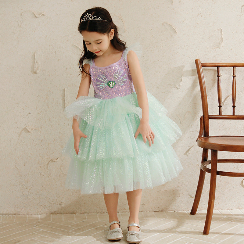 Girl in sparkly mint green princess dress and tiara, FashionRay kids fashion