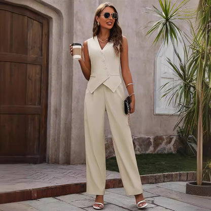 Woman in cream sleeveless vest pantsuit with sunglasses, holding coffee, stylish FashionRay look