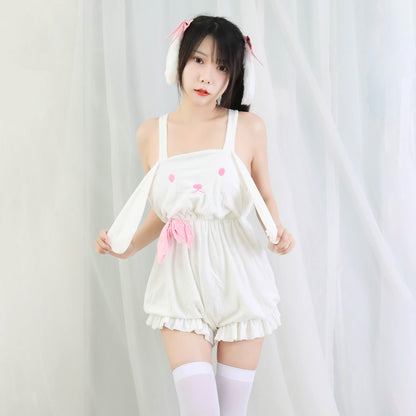 Woman wearing cute white bunny romper with pink details and bunny ears, FashionRay style