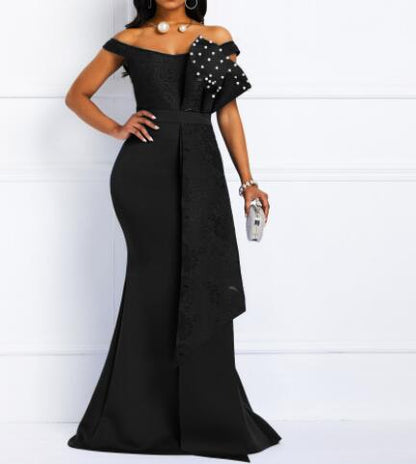Elegant off-shoulder black evening gown with pearl embellishments, FashionRay style