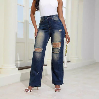 Woman wearing high-waisted ripped jeans and white top in a bright modern room, FashionRay style