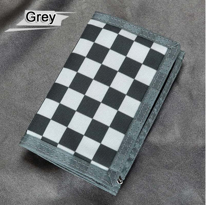 Grey checkered wallet on grey fabric, FashionRay trendy accessory