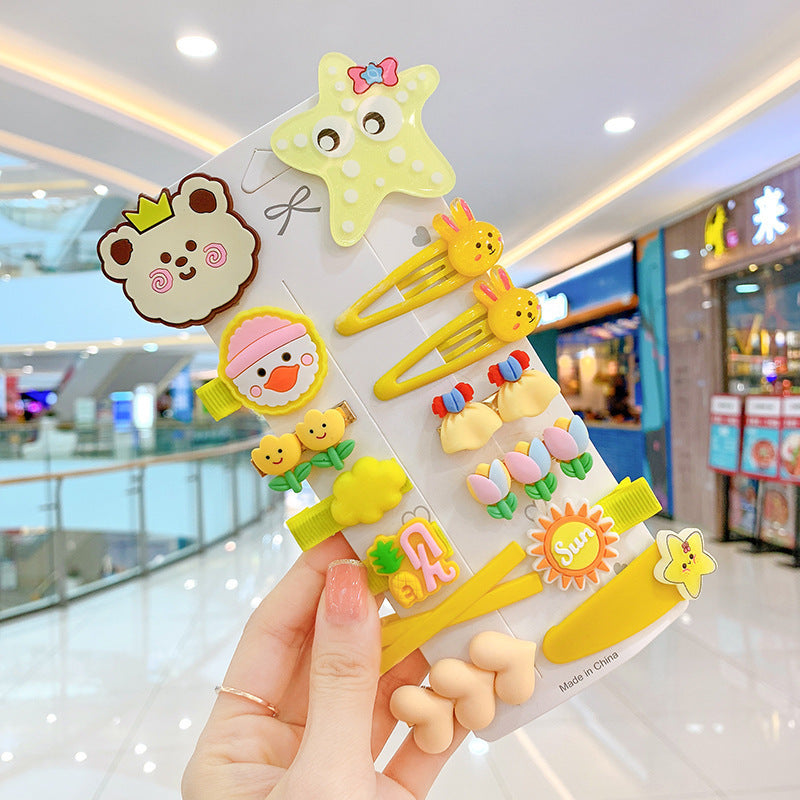 Colorful cute hair clips with animal and flower designs held in hand at FashionRay store mall.