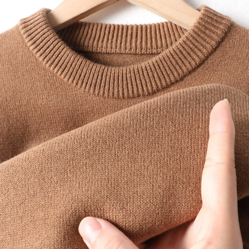 Soft brown knit sweater on hanger, close-up texture, FashionRay cozy fashion style