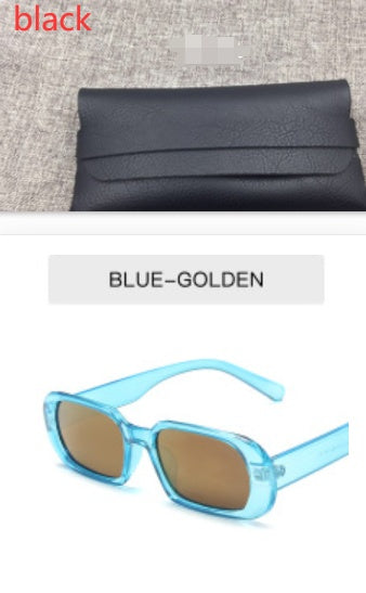 Black leather clutch on fabric, blue-golden trendy sunglasses by FashionRay