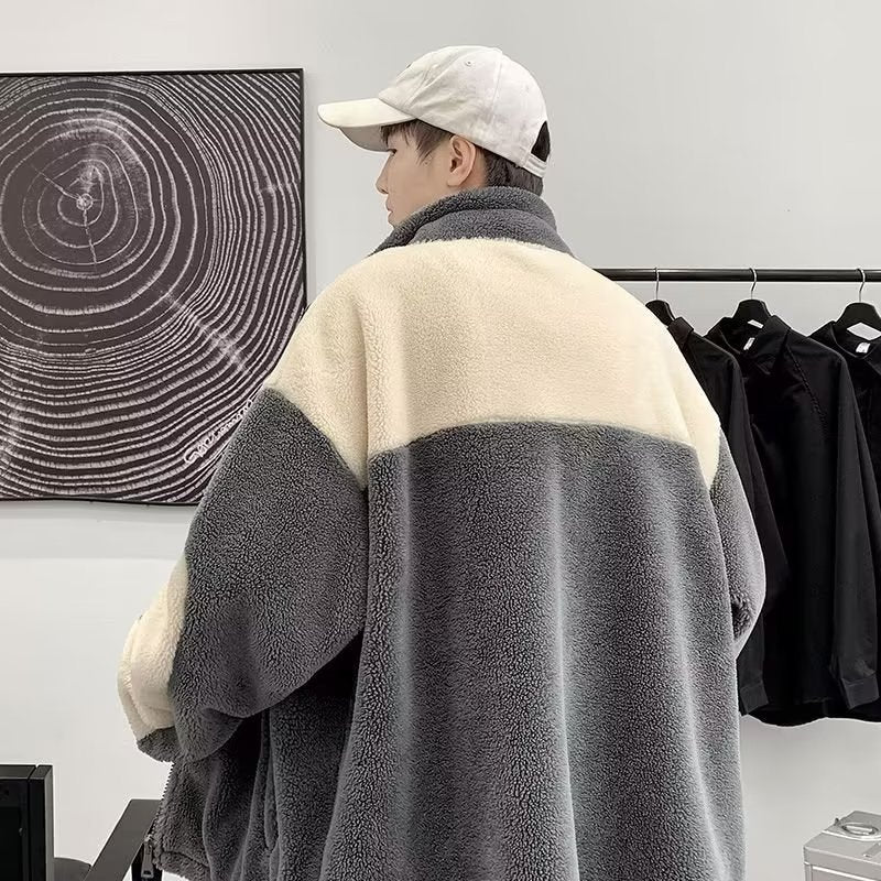 Man in colorblock fleece jacket and white cap at FashionRay, modern wall art background