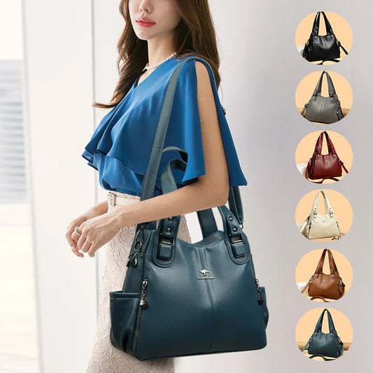 Woman carrying a stylish blue leather handbag with multiple color options, FashionRay trendy accessory