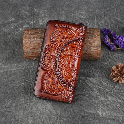 FashionRay embossed brown leather wallet with artistic pattern on rustic background