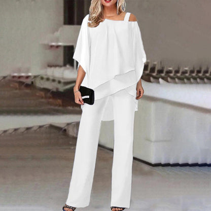 Woman in a trendy white two-piece pants set with off-shoulder top, FashionRay style